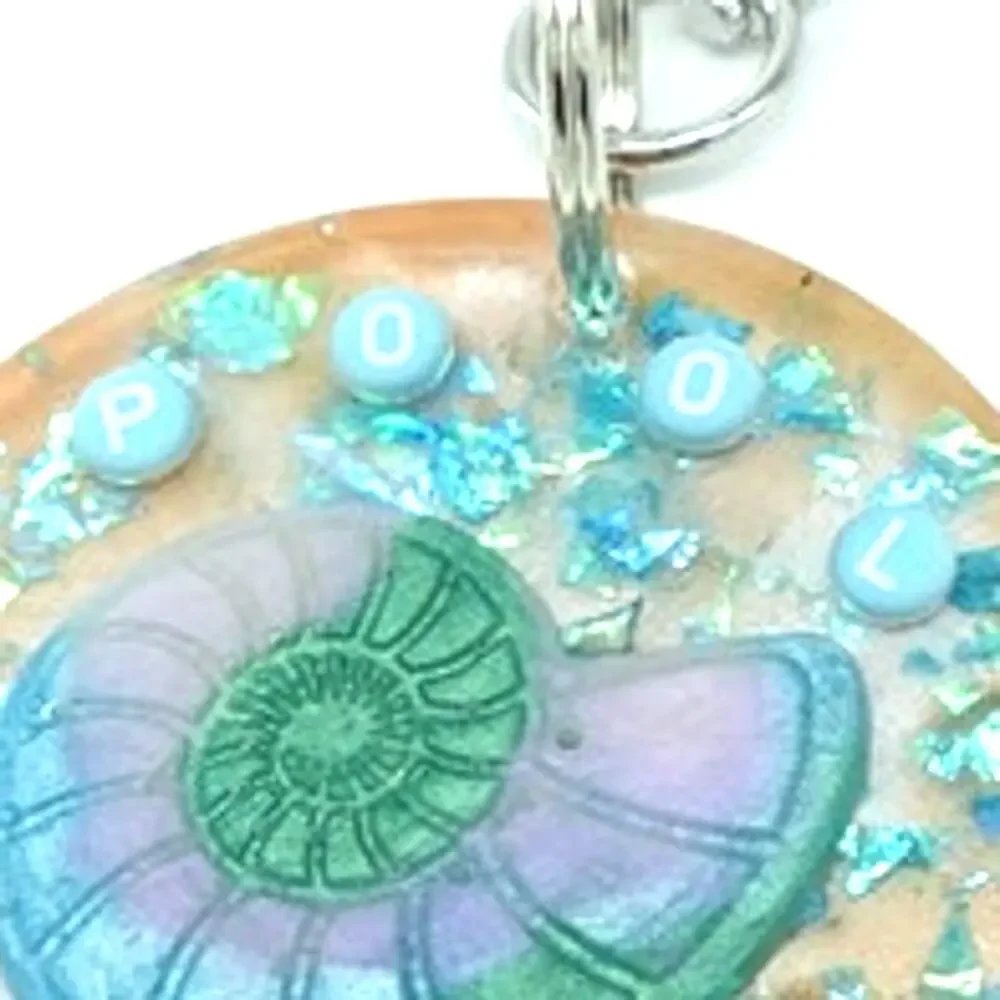 Tropical  Nautilus Shell resin Keychain with teal accents!  POOL KEY Chain